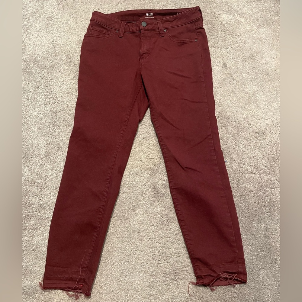 Women’s size 8 maroon skinny ankle jeans with frayed hems